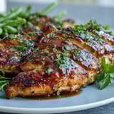 Honey mustard chicken with green beans in a golden honey-mustard glaze, served with tender-crisp green beans for a fresh, wholesome dinner.