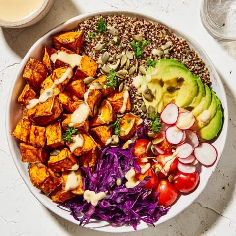 Vibrant Complete Veggie Bowl featuring fluffy quinoa, colorful veggies, and creamy tahini vinaigrette.
