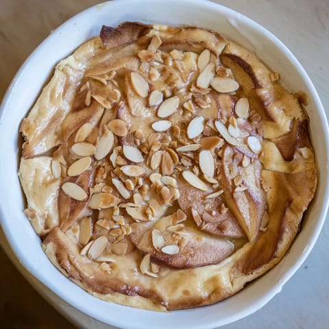 This warm, spiced Rustic Crustless Apple Pie features tender apples baked in a creamy custard base.