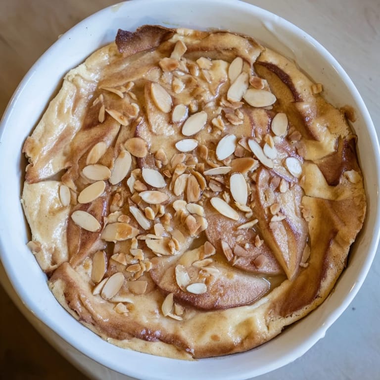 This warm, spiced Rustic Crustless Apple Pie features tender apples baked in a creamy custard base.