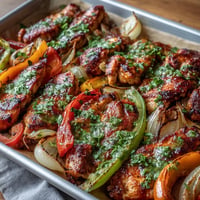 Sheet pan chicken fajitas with colorful peppers, perfectly roasted for a zesty weeknight dinner.